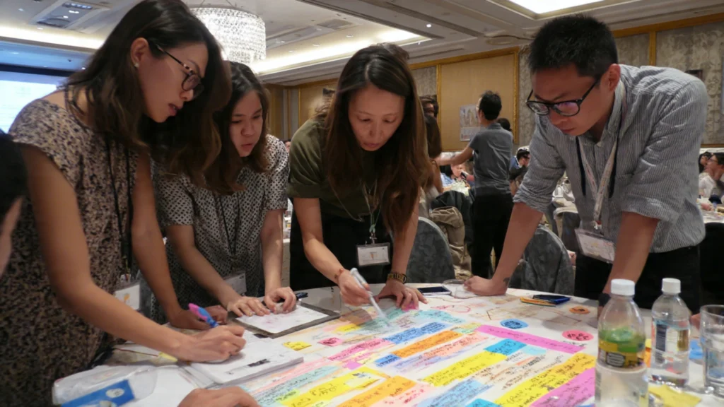 NGO professionals collaborating at a workshop in Taipei Taiwan